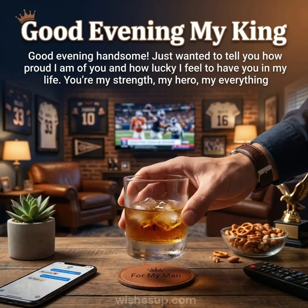 A hand lifts a chilled glass of amber whiskey from a leather coaster in a cozy den. Warm light glows against a brick wall with framed jerseys and a football game on TV, creating a relaxed atmosphere with rich wooden textures.